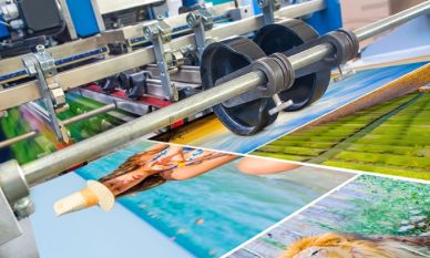 Offset machine printing a banner